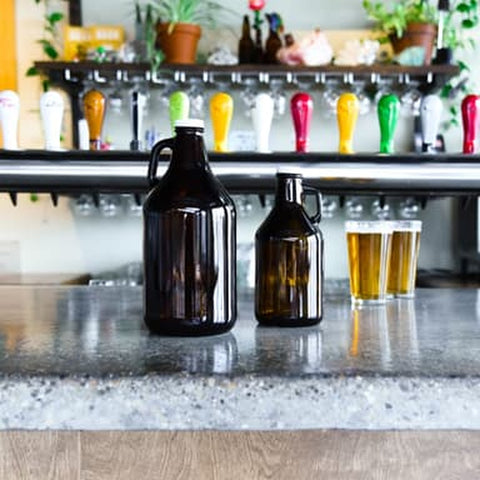 Libbey Glass 70217 64 oz. Amber Growler with Lid