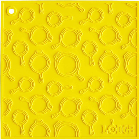 Lodge Manufacturing AS7SKT21 7" x 7" Yellow Skillet Pattern Silicone Trivet / Pot Holder