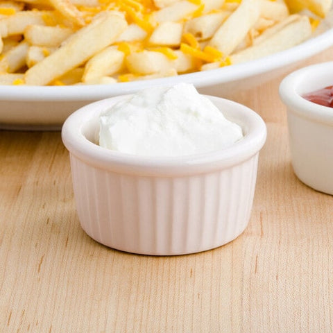 Tuxton China BEX-0252 2.5 oz. Eggshell Fluted China Ramekin
