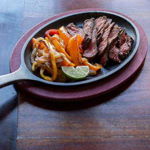 Lodge LFSR3 Pre-Seasoned Cast Iron Fajita Set with Wood Underliner and Chili Pepper Handle Holder