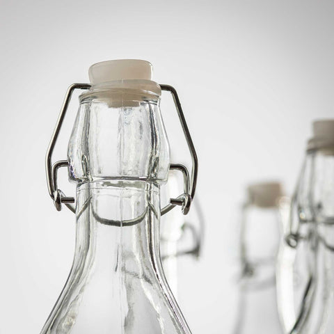 Tablecraft RSB33 34 oz Prima Collection Resealable Clear Glass Bottle