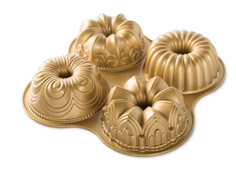 91377 Nordic Ware Fabulous foursome. Includes the Fleur de Lis,  Elegant Party, Cathedral and Chiffon Bundts in petite sizes