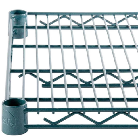 Green metal wire rack with connectors on a white background